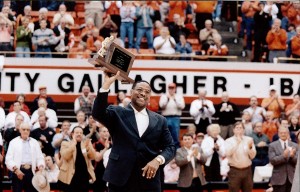 Monday,Kenny_Holding plaque in GIA